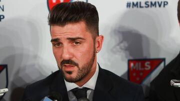 David Villa picks up his MVP award.