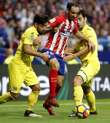 Juanfran y Trigueros.
