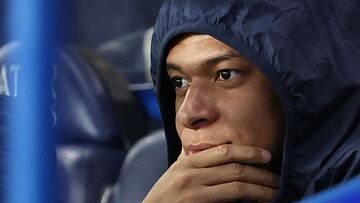 Paris Saint-Germain's French forward #07 Kylian Mbappe sits on the bench prior to the French L1 football match between Paris Saint-Germain (PSG) and Clermont Foot 63 at the Parc des Princes stadium in Paris on April 6, 2024. (Photo by FRANCK FIFE / AFP)