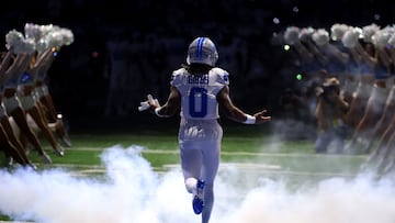 DETROIT, MICHIGAN - DECEMBER 04: Jahmyr Gibbs #0 of the Detroit Lions walks out of the tunnel before the game against the Dallas Cowboys at Ford Field on December 04, 2025 in Detroit, Michigan. Gregory Shamus/Getty Images/AFP (Photo by Gregory Shamus / GETTY IMAGES NORTH AMERICA / Getty Images via AFP)