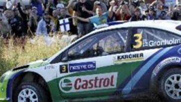 <b>GANÓ EN CASA.</b> El finlandés Marcus Gronholm se adjudicó el Rally de Finlandia por delante del líder del Mundial, Sebastián Loeb.