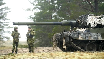 Estonian army servicemen guard their CV-90 infantry fighting vehicle during live fire exercise in Perakula, Estonia February 15, 2023. REUTERS/Ints Kalnins