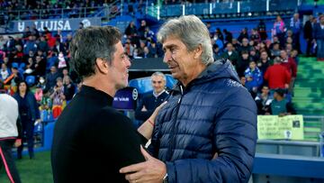 Pellegrini, junto a Quique.