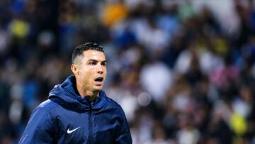 Nassr's Portuguese forward #07 Cristiano Ronaldo reacts while warming up during the Saudi Pro League football match between Damac FC and Al-Nassr FC at Prince Sultan bin Abdulaziz Sports City stadium in Abha on April 5, 2024. (Photo by Mohammed ALSHEHRI / AFP)