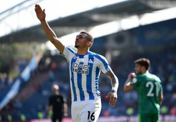Karlan Grant of Huddersfield Town celebrates after scoring his team's first goal against Watford.
