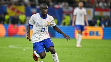 France's midfielder #13 N'golo Kante controls the ball during the UEFA Euro 2024 quarter-final football match between Portugal and France at the Volksparkstadion in Hamburg on July 5, 2024. (Photo by JAVIER SORIANO / AFP)