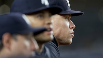 NEW YORK, NEW YORK - SEPTEMBER 27: Aaron Judge #99 of the New York Yankees look on from the dugout during the second inning against the Pittsburgh Pirates at Yankee Stadium on September 27, 2024 in New York City. Jim McIsaac/Getty Images/AFP (Photo by Jim McIsaac / GETTY IMAGES NORTH AMERICA / Getty Images via AFP)