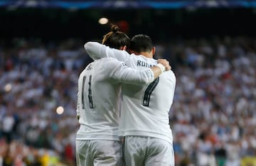 Real Madrid's Gareth Bale, left, celebrates with Cristiano Ronaldo