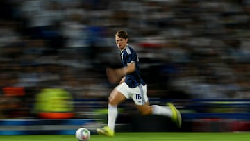 This slow shutter photograph shows Argentina's midfielder #18 Nico Paz running with the ball during a friendly football match between Argentina and Zambia at La Bombonera stadium in Buenos Aires on March 31, 2026. (Photo by Luis ROBAYO / AFP)
