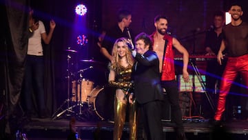 Argentina's President Javier Milei waves next to his girlfriend, actor Fatima Florez, during a play in Mar del Plata, Buenos Aires, Argentina, December 29, 2023. REUTERS/Stringer NO RESALES. NO ARCHIVES