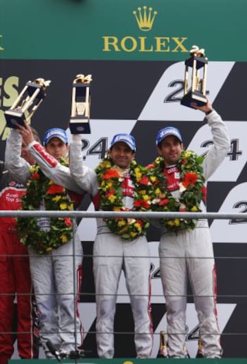 El tercer puesto que Audi Sport e-tron quattro ha sido para el equipo de Oliver Jarvis, Marc Gene y Lucas Di Grassi celebrando el tercer puesto en el podio