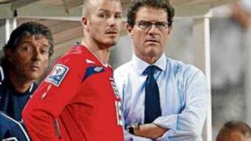 Capello dando instrucciones a Beckham