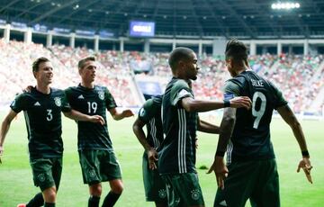 Germany's David Selke celebrates with his team.