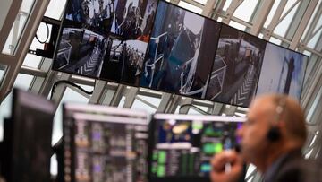 This handout photo released by NASA shows monitors inside firing room four displaying views of Launch Complex 39A during the attempted launch of a SpaceX Falcon 9 rocket carrying the company's Crew Dragon spacecraft on NASAx92s SpaceX Demo-2 mission