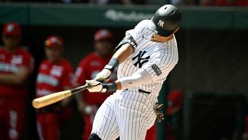 New York Yankees' Osvaldo Cabrera tries to hit the ball during the first inning of the first exhibition baseball game against Mexico's Diablos Rojos at the Alfredo Harp Helu stadium in Mexico City on March 24, 2024. (Photo by ALFREDO ESTRELLA / AFP)