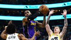 SALT LAKE CITY, UTAH - APRIL 04: LeBron James #6 of the Los Angeles Lakers looks to pass around Collin Sexton #2 and Luka Samanic #19 of the Utah Jazz during the second half at Vivint Arena on April 04, 2023 in Salt Lake City, Utah.NOTE TO USER: User expressly acknowledges and agrees that, by downloading and or using this photograph, User is consenting to the terms and conditions of the Getty Images License Agreement.   Alex Goodlett/Getty Images/AFP (Photo by Alex Goodlett / GETTY IMAGES NORTH AMERICA / Getty Images via AFP)