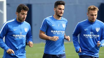 Juankar, junto a Jony y Ontiveros en un entrenamiento.