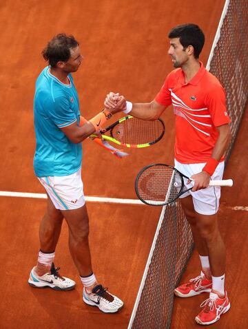 Common sight | Nadal shakes hands with Djokovic.