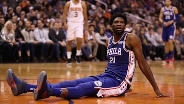 PHOENIX, AZ - DECEMBER 31: Joel Embiid #21 of the Philadelphia 76ers reacts after a foul call during the first half of the NBA game against the Phoenix Suns at Talking Stick Resort Arena on December 31, 2017 in Phoenix, Arizona. NOTE TO USER: User expressly acknowledges and agrees that, by downloading and or using this photograph, User is consenting to the terms and conditions of the Getty Images License Agreement.   Christian Petersen/Getty Images/AFP
 == FOR NEWSPAPERS, INTERNET, TELCOS &amp; TELEVISION USE ONLY ==