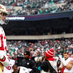 Why is Brock Purdy waiting on a second opinion regarding his injured elbow?