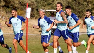 Los jugadores del Atlético durante la sesión de entrenamiento.