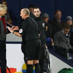 Wenger charged after confronting officials