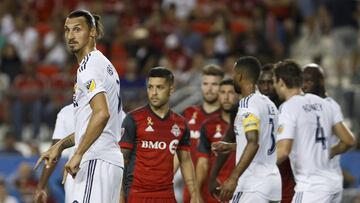 Los Angeles Galaxy forward Zlatan Ibrahimovic (9) gets ready to defend a free kick during the second half of an MLS soccer game against Toronto FC, Saturday, Sept. 15, 2018 in Toronto. (Cole Burston/Canadian Press via AP)