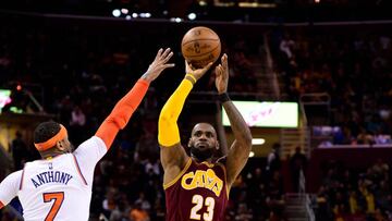 CLEVELAND, OH - FEBRUARY 23: LeBron James #23 of the Cleveland Cavaliers shoots over Carmelo Anthony #7 of the New York Knicks during the second half at Quicken Loans Arena on February 23, 2017 in Cleveland, Ohio. The Cavaliers defeated the Knicks 119-104. NOTE TO USER: User expressly acknowledges and agrees that, by downloading and/or using this photograph, user is consenting to the terms and conditions of the Getty Images License Agreement. Jason Miller/Getty Images/AFP
== FOR NEWSPAPERS, INTERNET, TELCOS & TELEVISION USE ONLY ==