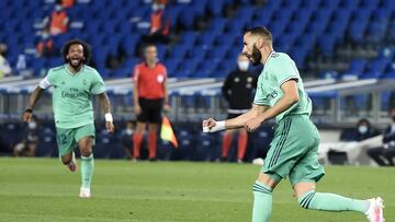 SAN SEBASTIAN, SPAIN - JUNE 21: Karim Benzema of Real Madrid celebrates scoring his teams second goal during the Liga match between Real Sociedad and Real Madrid CF at Estadio Anoeta on June 21, 2020 in San Sebastian, Spain. (Photo by Juan Manuel Serrano