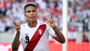 Peru's forward Paolo Guerrero celebrates after scoring a goal during an international friendly football match between Saudi Arabia and Peru at Kybunpark stadium in St. Gallen on June 3, 2018. / AFP PHOTO / Fabrice COFFRINI