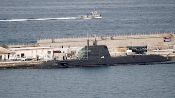 FILE PHOTO: A British nuclear Astute-class submarine HMS Ambush is seen docked in a port while it is repaired after it was involved in a "glancing collision" with a merchant vessel off the coast of the peninsula of Gibraltar on Wednesday, in the British overseas territory of Gibraltar, July 21, 2016. REUTERS/Jon Nazca/File Photo