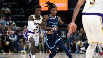 Memphis Grizzlies guard Ja Morant (12) dribbles as Los Angeles Lakers guard Dennis Schroder (17)