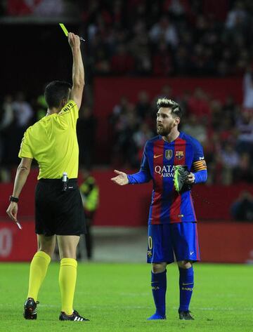 Messi receives yellow card.