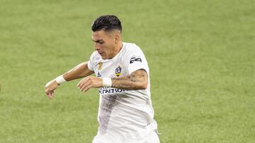 Sep 2, 2020; Portland, Oregon, USA; Portland Timbers defender Julio Cascante (18) defends Los Angeles Galaxy forward Cristian Pavon (10) during the first half at Providence Park. Mandatory Credit: Troy Wayrynen-USA TODAY Sports