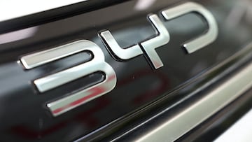 FILE PHOTO: A BYD logo is displayed on a car at a dealership in Sant Cugat del Valles, near Barcelona, Spain, September 12, 2025. REUTERS/ Albert Gea/File Photo