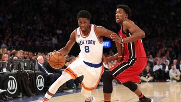 Mar 29, 2017; New York, NY, USA; New York Knicks shooting guard Justin Holiday (8) drives against Miami Heat shooting guard Josh Richardson (0) during the third quarter at Madison Square Garden. Mandatory Credit: Brad Penner-USA TODAY Sports