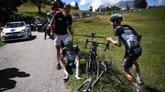 AFP/ Team Bora rider Germany's Emanuel Buchmann is (L) and Team Bora rider Austria's Gregor Muhlberger reacts after a crash during the fourth stage of the 72nd edition of the Criterium du Dauphine cycling race, 153 km between Ugine and Megeve on August 15, 2020. (Photo by Anne-Christine POUJOULAT / AFP)