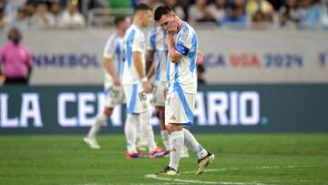 Argentina's forward #10 Lionel Messi gestures after Ecuador tied the match and before a penalty shoot out during the Conmebol 2024 Copa America tournament quarter-final football match between Argentina and Ecuador at NRG Stadium in Houston, Texas, on July 4, 2024. (Photo by JUAN MABROMATA / AFP)