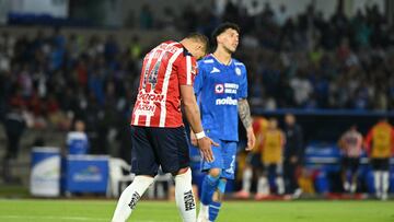 Guadalajara's forward #14 Javier Hernandez reacts after missing from the penalty spot during the Liga MX Apertura quarter-final second leg football match between Cruz Azul and Guadalajara at the Olimpico Universitario Stadium in Mexico City on November 30, 2025. (Photo by Yuri CORTEZ / AFP)