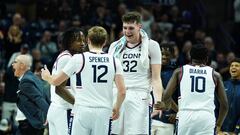 UConn Huskies center Donovan Clingan (32) and teammates react after a play.