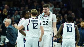 Nov 6, 2023; Storrs, Connecticut, USA; UConn Huskies center Donovan Clingan (32) and teammates react after a play against the Northern Arizona Lumberjacks in the first half at Harry A. Gampel Pavilion. Mandatory Credit: David Butler II-USA TODAY Sports