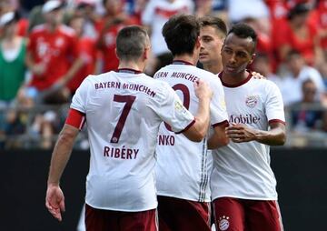 Julian Green #37 of FC Bayern Munich celebrates with teammates after scoring a goal against FC Internazionale during an International Champions Cup match at Bank of America Stadium on July 30