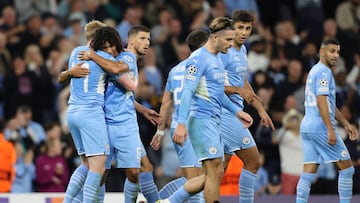 MANCHESTER, ENGLAND - SEPTEMBER 15: Nathan Ake and Kevin De Bruyne of Manchester City acknowledge their part played in their side's second goal which was an own goal scored by Nordi Mukiele of RB Leipzig (not pictured) during the UEFA Champions Leagu