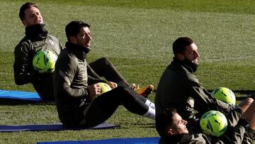 Los jugadores del Atlético durante el entrenamiento de ayer.