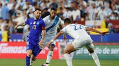 Jun 14, 2024; Landover, Maryland, USA; Argentina forward Lionel Messi (10) dribbles the ball as Guatemala midfielder Marco Dominguez (5) and Guatemala midfielder Jonathan Franco (22) defend in the first half at Commanders Field. Mandatory Credit: Geoff Burke-USA TODAY Sports