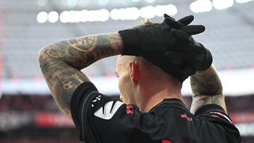 Bayer Leverkusen's Spanish defender #20 Alejandro Grimaldo reacts during the German first division Bundesliga football match Bayer 04 Leverkusen v 1 FC Union Berlin in Leverkusen, western Germany on November 12, 2023. (Photo by INA FASSBENDER / AFP) / DFL REGULATIONS PROHIBIT ANY USE OF PHOTOGRAPHS AS IMAGE SEQUENCES AND/OR QUASI-VIDEO