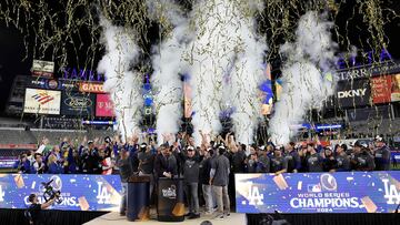 NEW YORK, NEW YORK - OCTOBER 30: The Los Angeles Dodgers celebrate on the trophy stand after defeating the New York Yankees 7-6 in game 5 to win the 2024 World Series at Yankee Stadium on October 30, 2024 in the Bronx borough of New York City. Elsa/Getty Images/AFP (Photo by ELSA / GETTY IMAGES NORTH AMERICA / Getty Images via AFP)