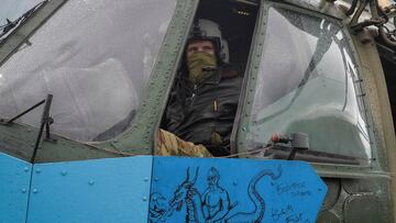 A Ukrainian military pilot is seen in a helicopter, amid Russia's invasion of Ukraine, in Donbas region, Ukraine April 8, 2023. REUTERS/Oleksandr Klymenko