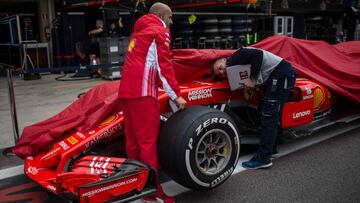 Ferrari&#039;s F1 team mechanics check one of their cars at the paddock of the Interlagos racetrack in Sao Paulo, Brazil on November 8, 2018, three days ahead of the Brazil Formula One Grand Prix. (Photo by Mauro Pimentel / AFP)