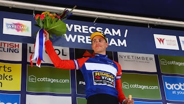 Cycling - Tour of Britain - Stage 2 - Wrexham to Wrexham - Britain - September 4, 2023 Jumbo – Visma's Olav Kooij celebrates on the podium after winning stage 2 REUTERS/Molly Darlington